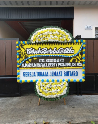 Papan Bunga Duka di Amasangan